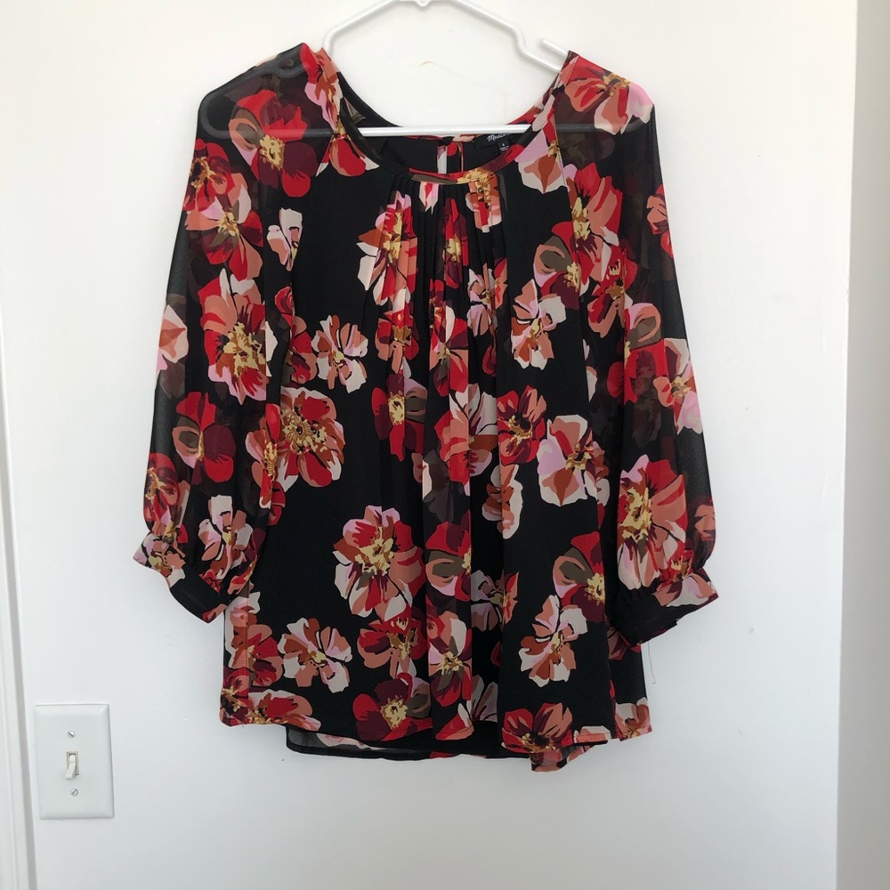 Black floral blouse